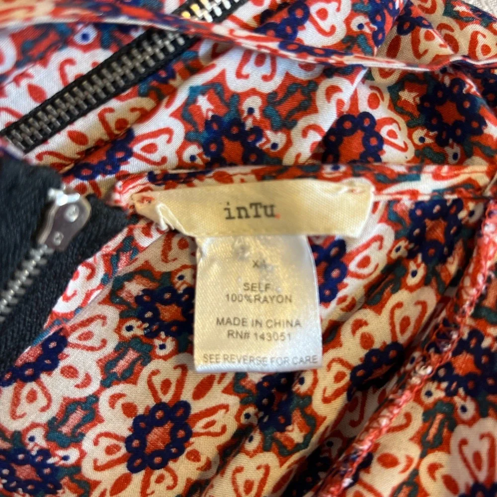 Intu  cold shoulder dress with rust navy blue black and white pattern.  Size XS - Picture 2 of 5